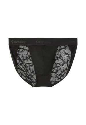 Slip donna neri Calvin Klein con pannelli laterali in pizzo floreale e fascia elastica con logo.