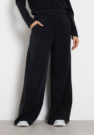 Guess OLYMPE WIDE  - Pantaloni sportivi - schwarz