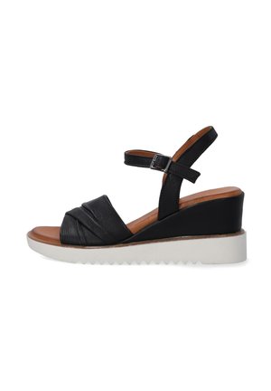 Schwarze Leder-Plateausandalen mit einem gewickelten Frontdesign, verstellbarem Knöchelriemen und weißer strukturierter Sohle.
