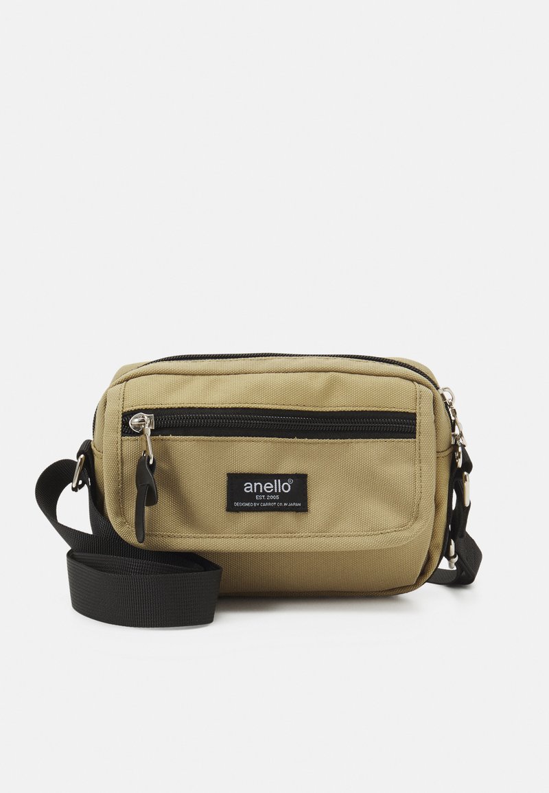anello MINI SHOULDER UNISEX Across body bag beige Zalando.ie