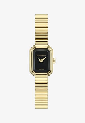 Guldfarvet ur med et slankt sekskantet urkasse, sort urskive og guldbelagt armbånd med ribbet design. Mærket "Swiss Made" på urskiven.