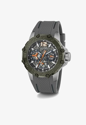 Gray silicone strap watch with a textured gray dial, black and green bezel, white and orange accents, featuring chronograph sub-dials and a tachymeter.