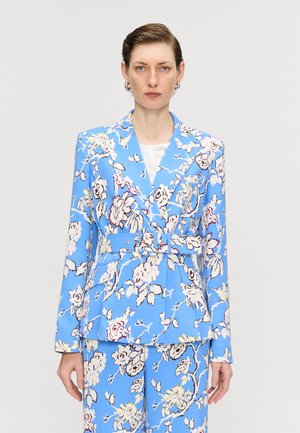 Blue floral blazer featuring a belted waist, structured lapels, and intricate rose patterns in pink and dark shades. Made from smooth fabric.