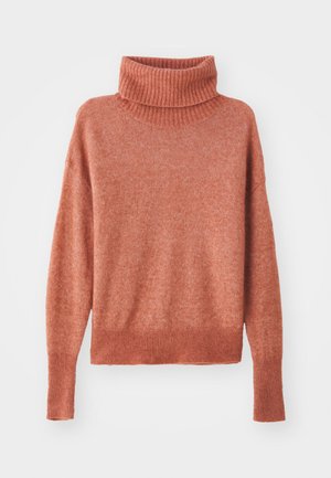 Turtleneck sweater in a soft, dusty rose color. Features ribbed texture at the collar and hem, with a relaxed fit and long sleeves.