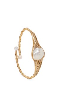 Gold wire bracelet featuring a large, glossy white pearl and two smaller pearls. Intricate twisted design with smooth accents.