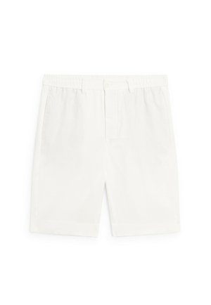 White tailored shorts with a flat front, waistband with elastic, and no pockets. Made of lightweight fabric, featuring a smooth texture.