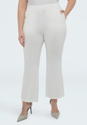 - Spodnie materiałowe