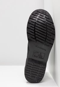 Dr. Martens Botines con cordones - black