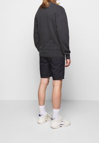 Han Kjøbenhavn Mikina - black