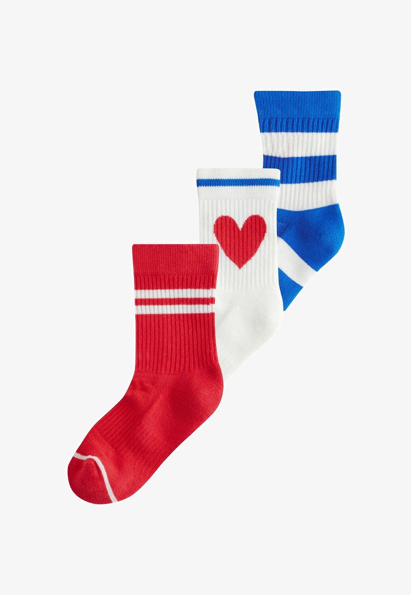 Kolm paari sokke: punased valgete triipudega, valged punaste südamega ja sinised valgete triipudega. Ribikujuline tekstuur kogu ulatuses.