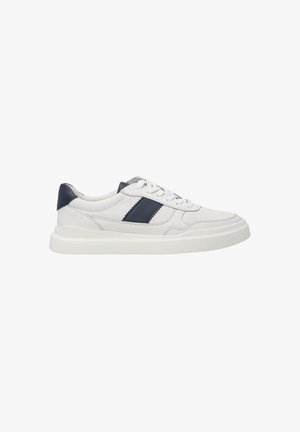 White sneaker with perforated material and navy accents. Features round toe, flat laces, and a thick white sole. Textured side panel.