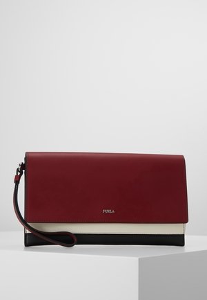 Rectangular tri-color clutch bag with a wrist strap, featuring burgundy, cream, and black sections, and a small metallic Furla logo on front.