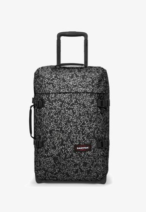 Borse duffel nera con un motivo bianco maculato, realizzata in tessuto resistente, con cinghie laterali regolabili e manico retrattile per il trasporto.