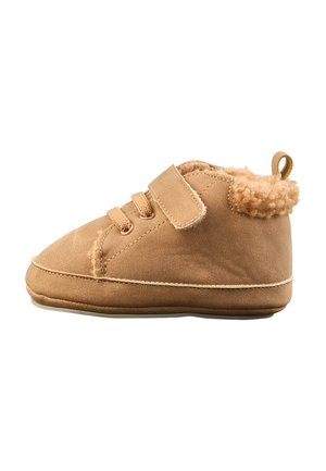 Brown baby shoe with soft sole, velcro strap, laces, and fuzzy lining around the ankle, shown from the side on a white background.