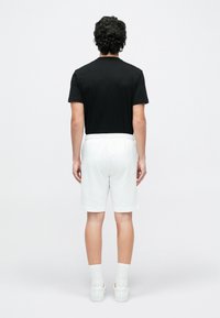 EA7 Emporio Armani TRAIN CORE BIG LOGO - Pantaloni de trening - white