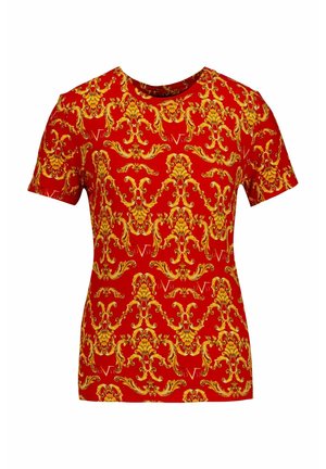 Red short-sleeve t-shirt featuring an intricate yellow ornate pattern, round neckline, and smooth texture. Designed for a fitted look.