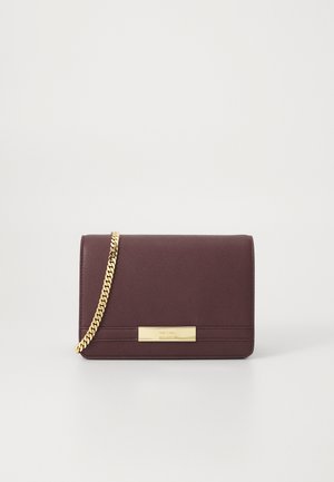Burgundy leather handbag with a gold chain strap, rectangular shape, and a flat front featuring a gold accent plate.