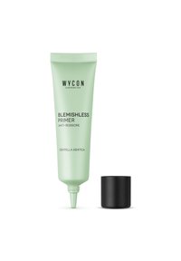 Primer senza imperfezioni in un tubo verde chiaro con testo nero. Il tappo è nero e il design presenta una punta appuntita per un'applicazione precisa.