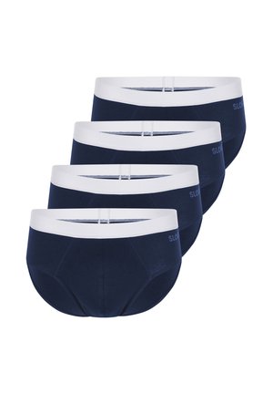 Vier marineblaue Slips mit weißen elastischen Bunds, diagonal übereinander gestapelt auf weißem Hintergrund.