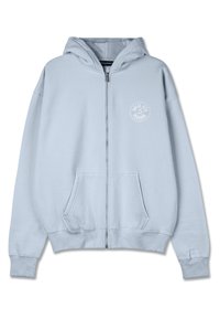 Lyseblå hettegenser med glidelås laget av mykt stoff. Har en lomme foran, ribbestrikkede mansjetter og en sirkulær logo på brystet.