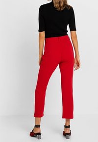 Nly by Nelly Broek - red