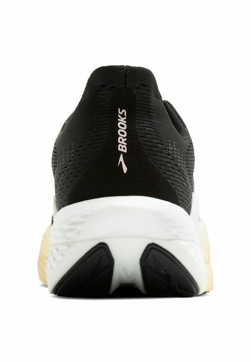 Schwarzer Laufschuh mit strukturiertem Obermaterial, weißer Sohle und schwarzem Gummiaußensohle. Merkmale ein Logo an der Ferse und ein aerodynamisches Design.