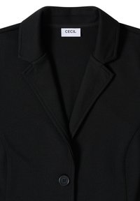 Blazer nero con colletto a risvolto, chiusura con un solo bottone e tessuto morbido e testurizzato. Etichetta che riporta "CECIL." Design semplice e su misura.