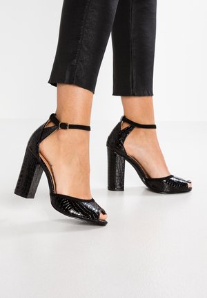 Peeptoe heels - black
