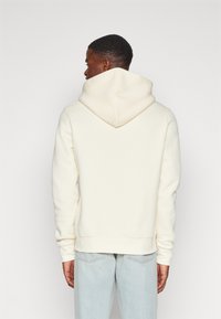 Tommy Hilfiger ARCHED VARSITY HOODY - Sportinis megztinis - calico