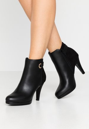 Bottines à talons hauts - black