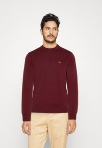 Lacoste Neule - zin