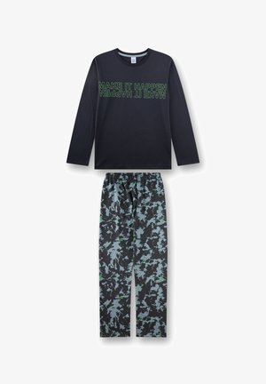 Navy long-sleeve top with "MAKE IT HAPPEN" text and black camouflage-style pants with green and gray splashes.