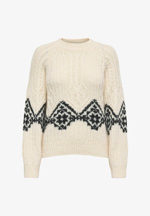 Jersey de punto color crema con un patrón geométrico negro a lo largo de la parte inferior y las mangas. Cuello redondo y puños y dobladillo acanalados.