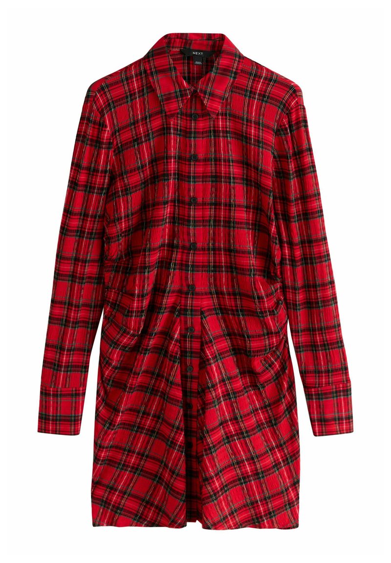 Rode geruite blouse jurk met lange mouwen, voorzien van zwarte en groene accenten in het patroon en zijzakken voor extra detail.