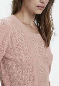 Cream T-shirt med print - light pink