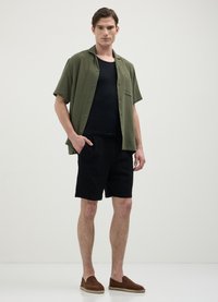 Calliope Pantaloni sportivi - nero