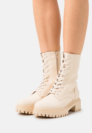 Platform ankle boots - beige