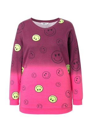 Lila und pinker Farbverlauf Sweatshirt mit großen Smiley-Gesichtsdrucken in Gelb und Schwarz. Mit langen Ärmeln und Rundhalsausschnitt.
