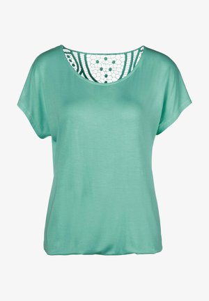 Hele roheline lühikeste varrukatega tops, millel on tekstuuriga pitsist seljaosa ja ümar kaelus. Pehme materjal, mugav lõige ja sile pind.