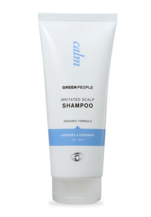 Organic shampoo in a white tube, featuring a blue label. Text reads "Irritated Scalp Shampoo," with "Lavender & Rosemary" at the bottom.