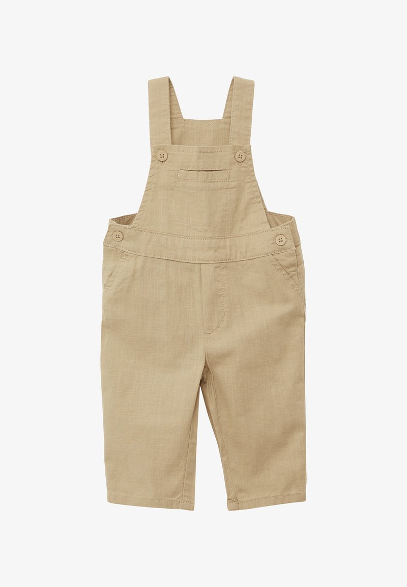 Beige cotton overalls with adjustable straps, front pocket, button accents, and straight legs, featuring a textured fabric finish.