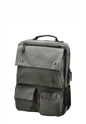 Gray fabric backpack with multiple pockets, a top handle, and zippers. Features a flap cover, snap closures, and mesh side pocket.