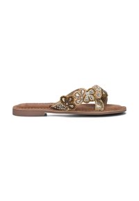 Platte sandalen met een tan kleurige binnenzool. Beaded bloemenontwerp in goud, wit en bruin op de banden. Suède-achtige textuur. Open teen stijl.