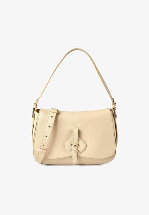 Beige leather shoulder bag with adjustable strap, front buckle detail, and curved flap closure against a white background.