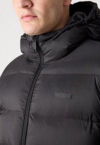 Calvin Klein Vinterjakker - black