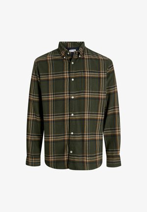 Grønn rutete skjorte i bomull med krage som kan knyes ned. Har hvite knapper, brystlomme og kontrasterende brune og svarte striper.