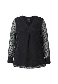 Maglietta nera a maniche lunghe con scollo a V, con maniche trasparenti a pois e corpo solido. Tessuto liscio con dettaglio a strati.