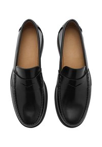 Black leather loafers with a smooth finish, featuring a stitched design and a V-shaped accent on the front. Light brown insoles are visible.