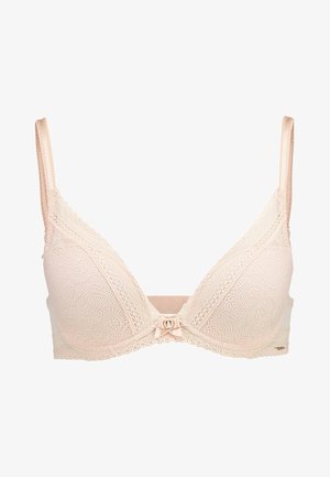 Lace padded bra in soft blush pink, featuring a delicate bow detail at the center with adjustable straps and light textured floral pattern.