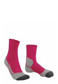 Chaussettes roses jusqu'à la cheville avec des accents gris au niveau des orteils et du talon, dotées d'une semelle intérieure texturée et de détails en motifs sur les côtés pour le confort et l'ajustement.